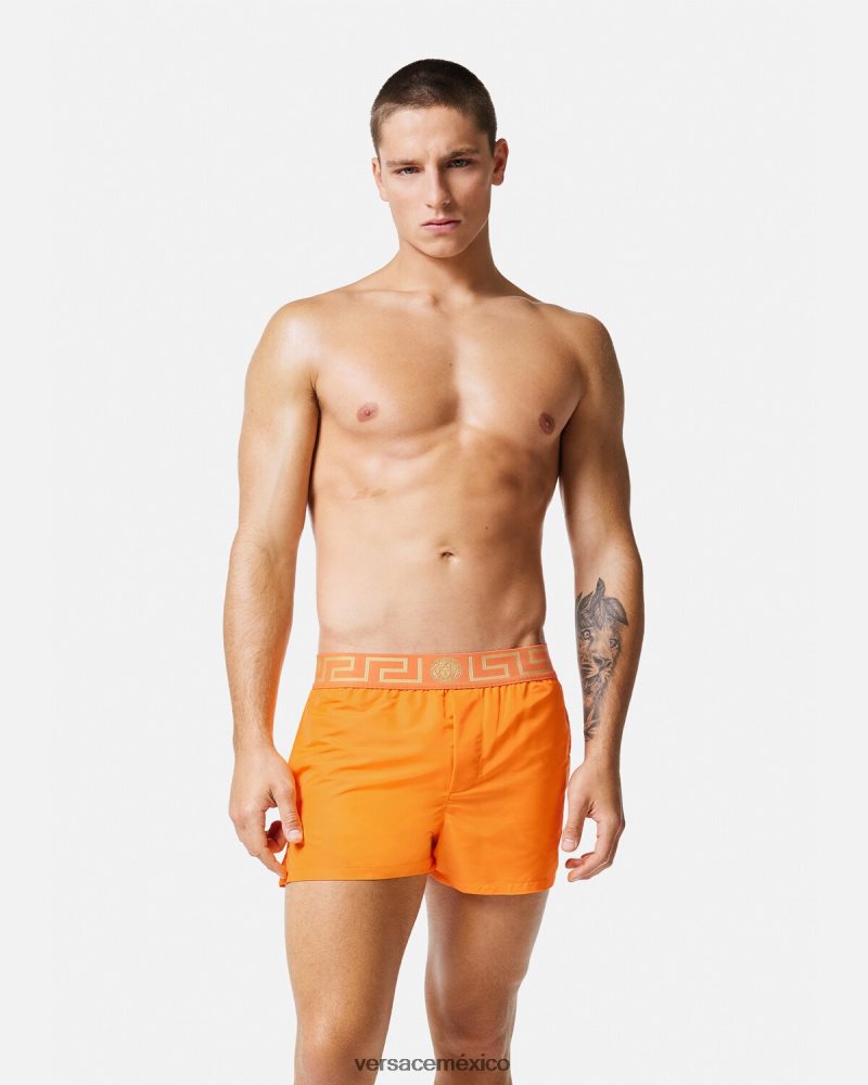 Versace shorts de baño con borde de greca naranja ropa interior y ropa de playa hombres 84626J1812
