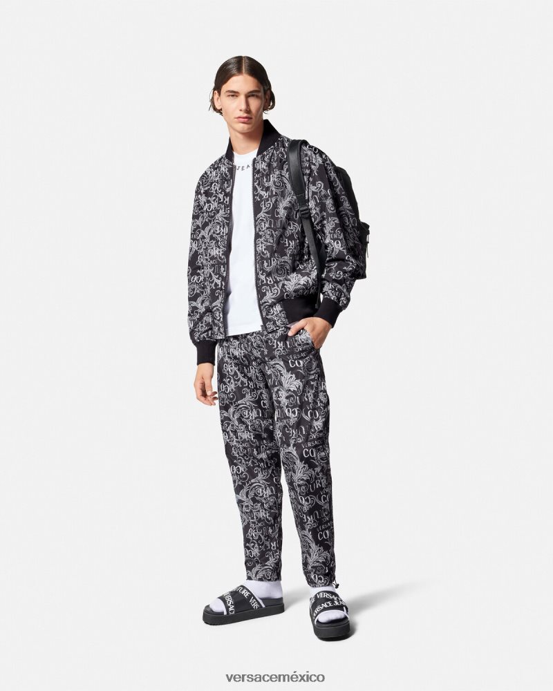 Versace pantalones de alta costura con logo negro y estampado ropa hombres 84626J2431