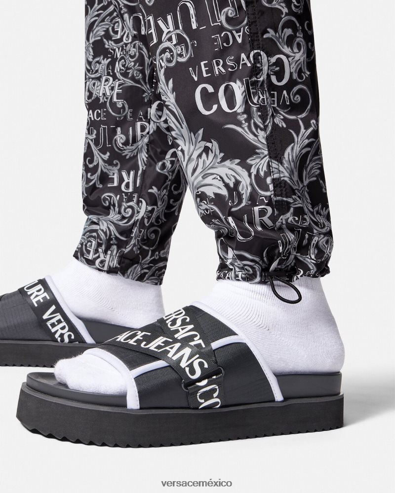 Versace pantalones de alta costura con logo negro y estampado ropa hombres 84626J2431