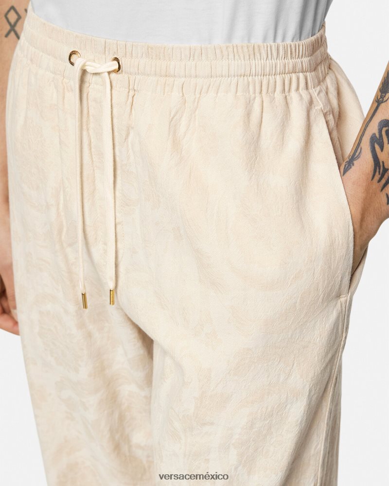 Versace pantalones de cambray con silueta barroca beige ropa hombres 84626J1442