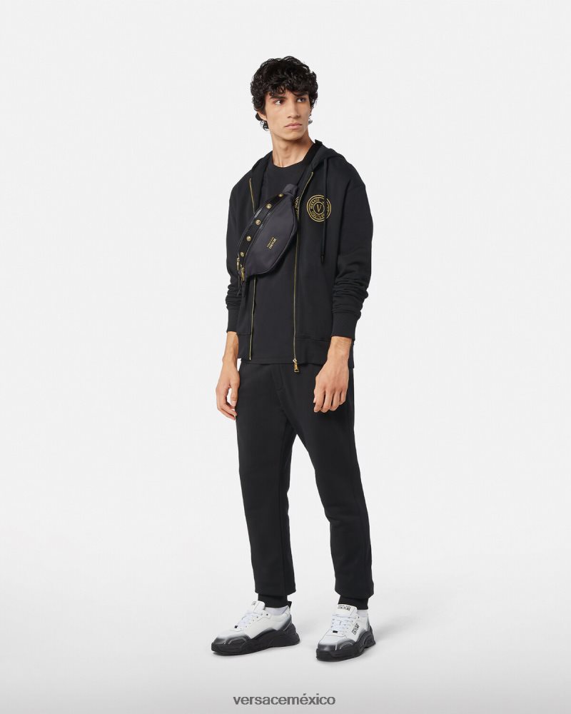 Versace pantalones deportivos con emblema en V oro negro ropa hombres 84626J2436