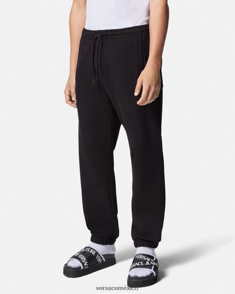 Versace pantalones deportivos con logo y rosas negro ropa hombres 84626J2381