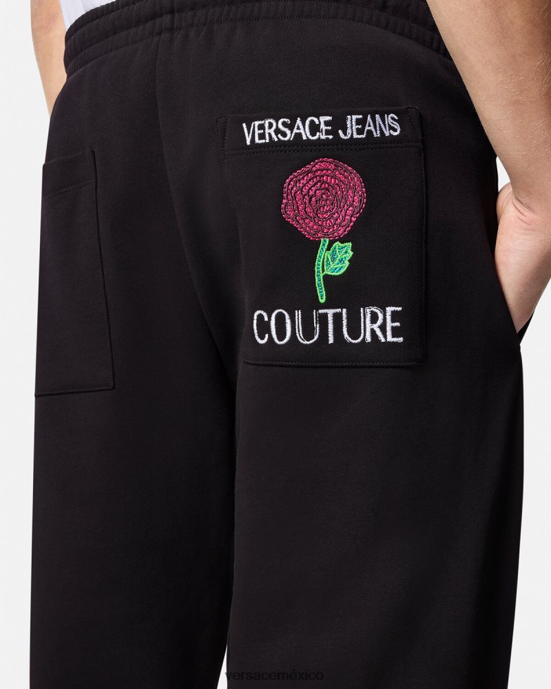 Versace pantalones deportivos con logo y rosas negro ropa hombres 84626J2381