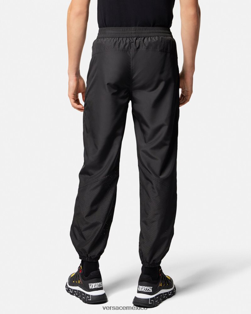 Versace pantalones deportivos con Greca de nailon negro ropa hombres 84626J1453