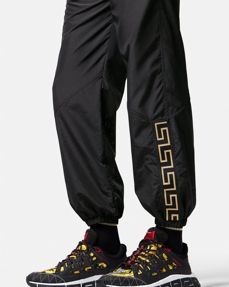 Versace pantalones deportivos con Greca de nailon negro ropa hombres 84626J1453