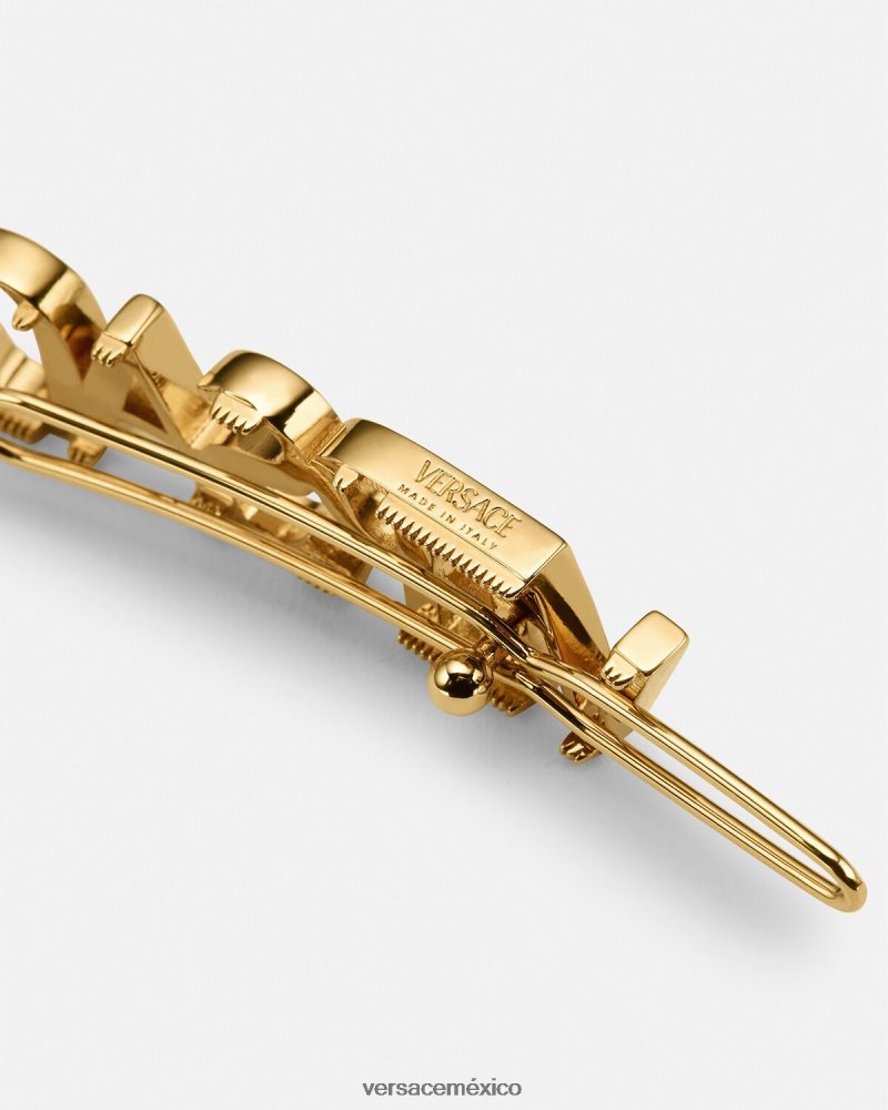 Versace clip de pelo derecho con logo oro accesorios mujer 84626J848