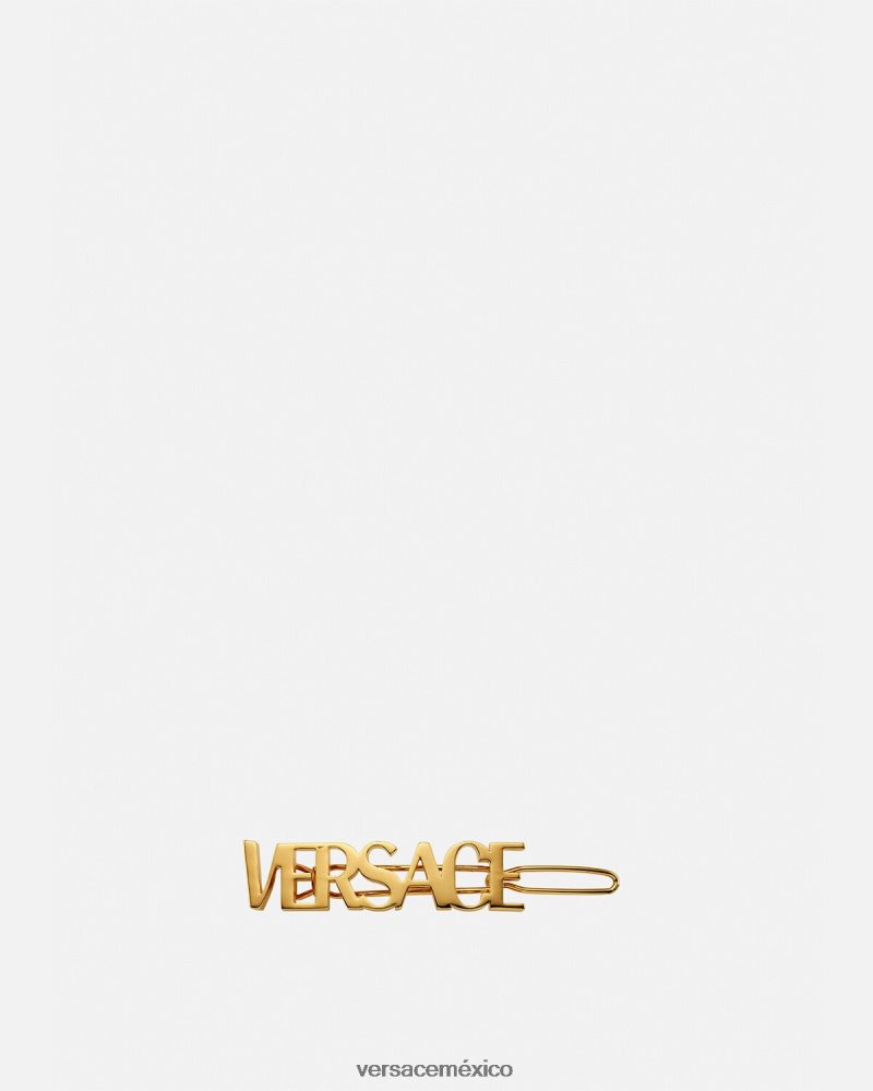 Versace clip para el cabello izquierdo con logo oro accesorios mujer 84626J849