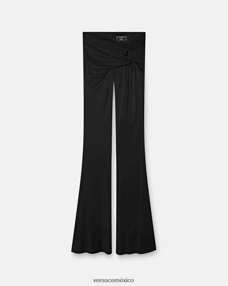 Versace pantalones acampanados anudados un color ropa mujer 84626J190