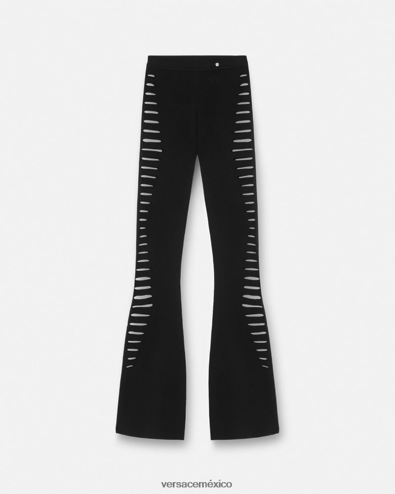 Versace pantalones acampanados de punto con cortes negro ropa mujer 84626J208