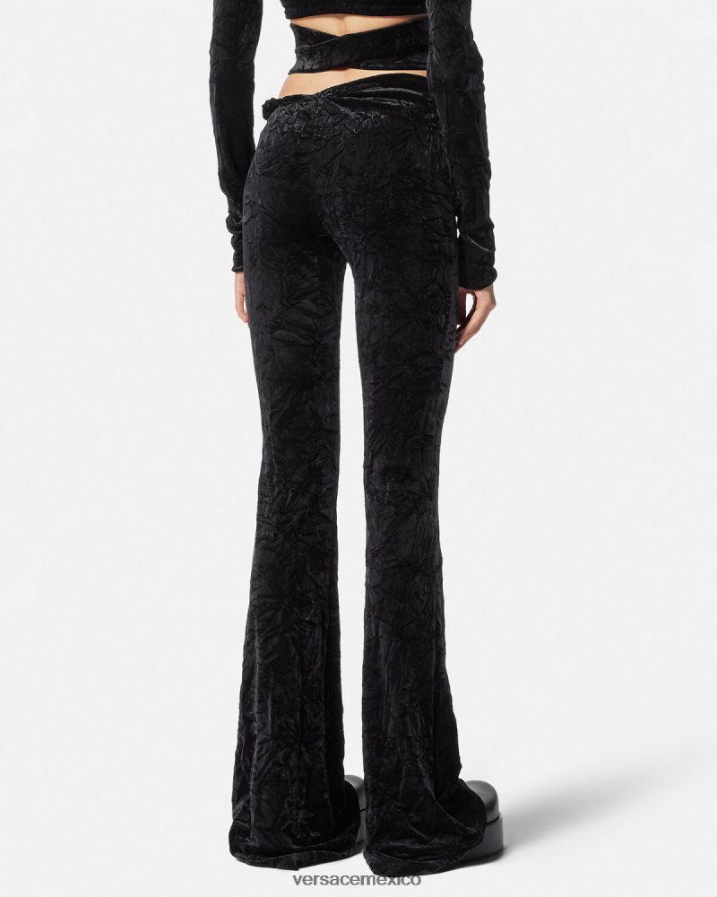 Versace pantalones acampanados de terciopelo enrollados negro ropa mujer 84626J216