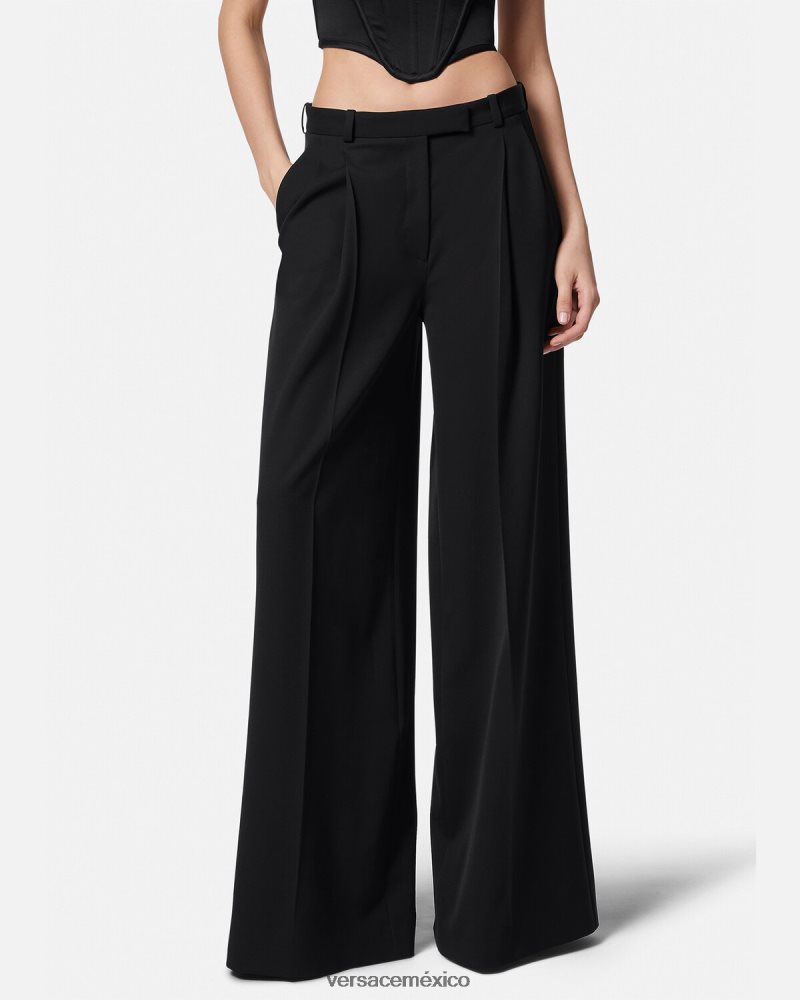 Versace pantalones anchos con pliegues negro ropa mujer 84626J200
