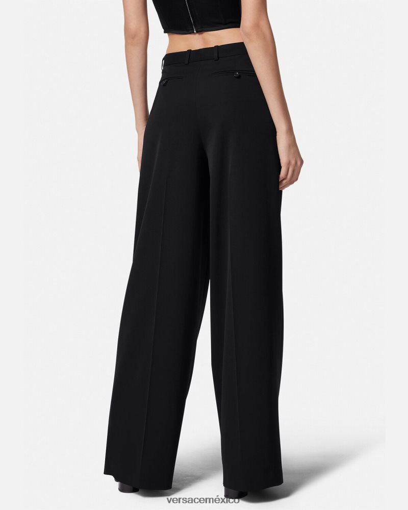 Versace pantalones anchos con pliegues negro ropa mujer 84626J200
