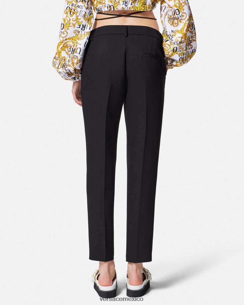 Versace pantalones con hebilla barroca negro ropa mujer 84626J2150