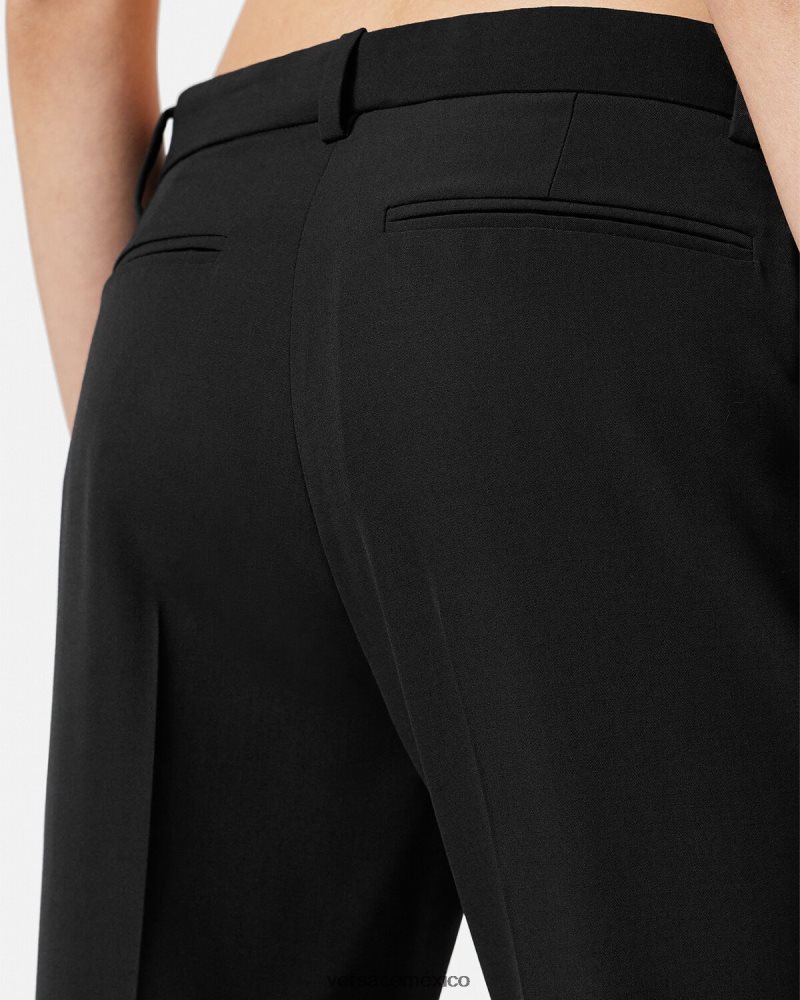 Versace pantalones formales acampanados negro ropa mujer 84626J205