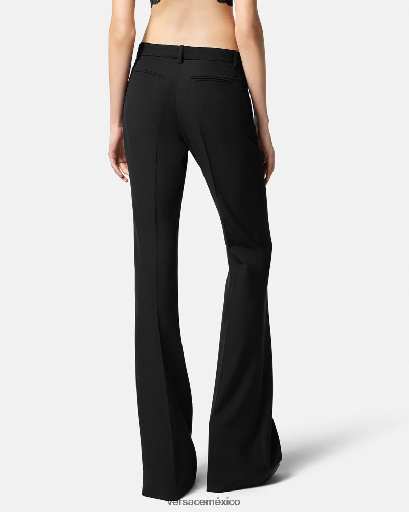 Versace pantalones formales acampanados negro ropa mujer 84626J205