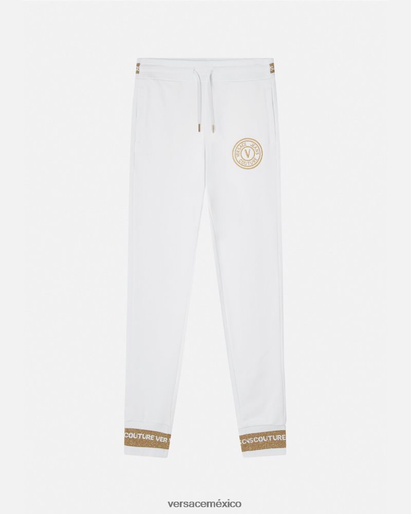Versace pantalones deportivos con emblema en V oro y blanco ropa mujer 84626J2245