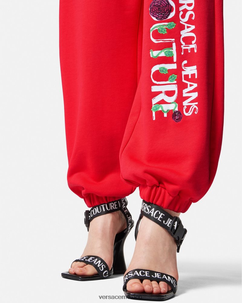 Versace pantalones deportivos con logo y rosas naranja ropa mujer 84626J2177
