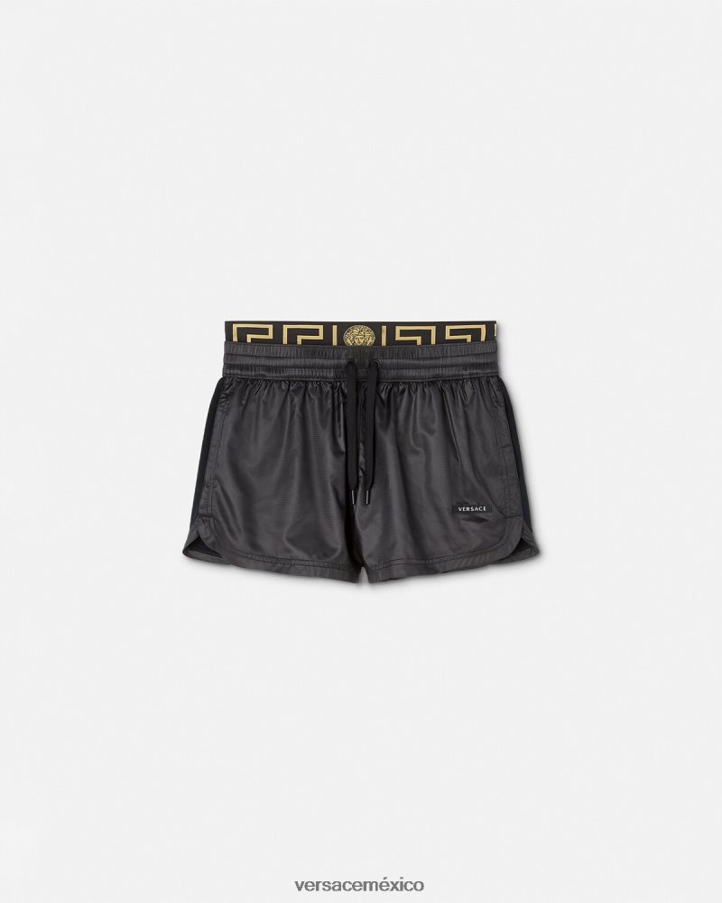 Versace pantalones cortos deportivos con borde de greca negro ropa mujer 84626J238