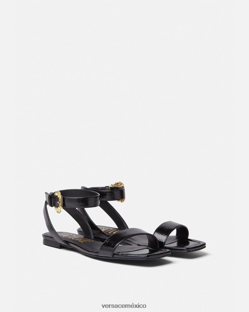 Versace sandalias planas Millie con hebilla barroca negro zapato mujer 84626J2259