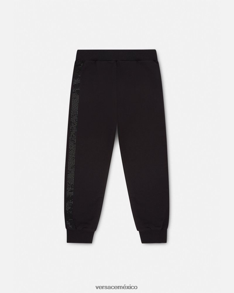 Versace pantalones de chándal con greca y cristales negro ropa niños 84626J1999