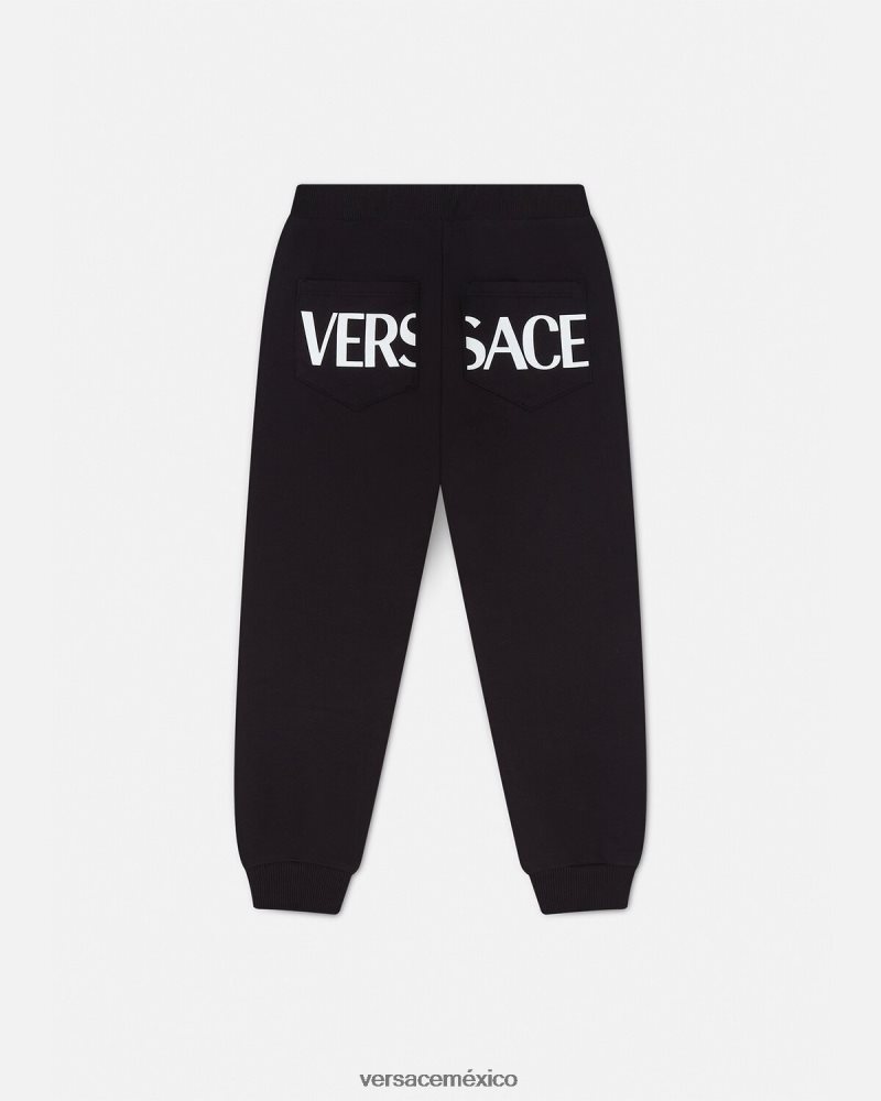 Versace pantalones deportivos con greca negro ropa niños 84626J2099